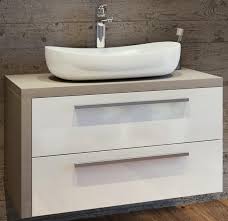 Slika proizvoda ARMAL ZETA BIJELA SJAJ BAZA 84x53,5x48 cm LIJEVA, VISEĆI ELEMENT S 2 LADICE, PLOČA SVIJETLI BETON, FRONTA BIJELA SJAJ